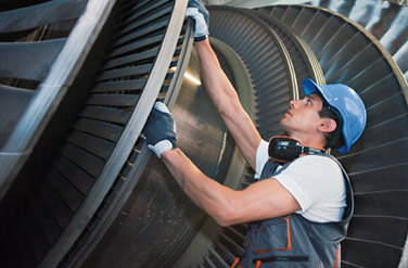 GST products for turbines Man inspecting turbines